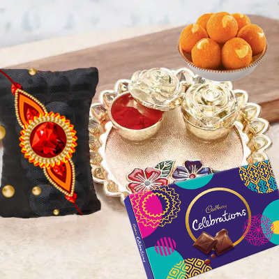 send fererro rocher, kaju katli, mixed flowers and dryfruits with rakhi to belgaum