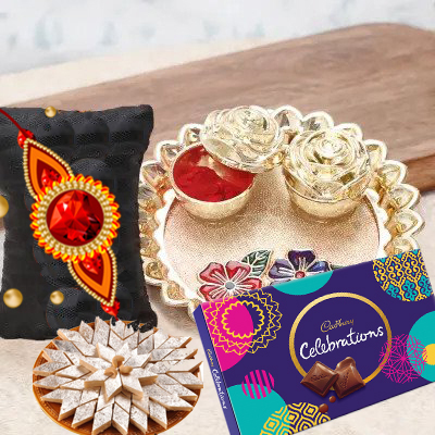 send fererro rocher, kaju katli, mixed flowers and dryfruits with rakhi to belgaum